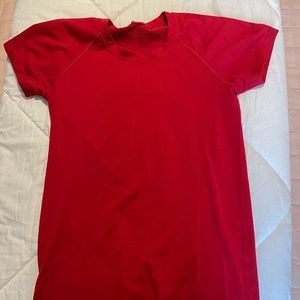 Red swiftly tech short sleeve shirt, size 6
